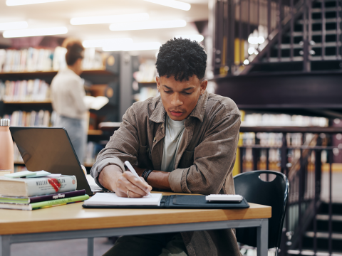 College student in library